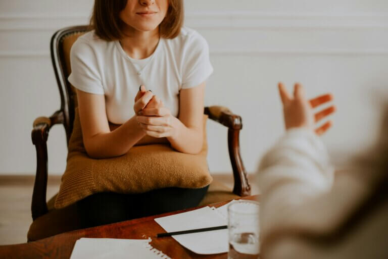 Patient speaking with a mental health provider during an appointment at The Remedy